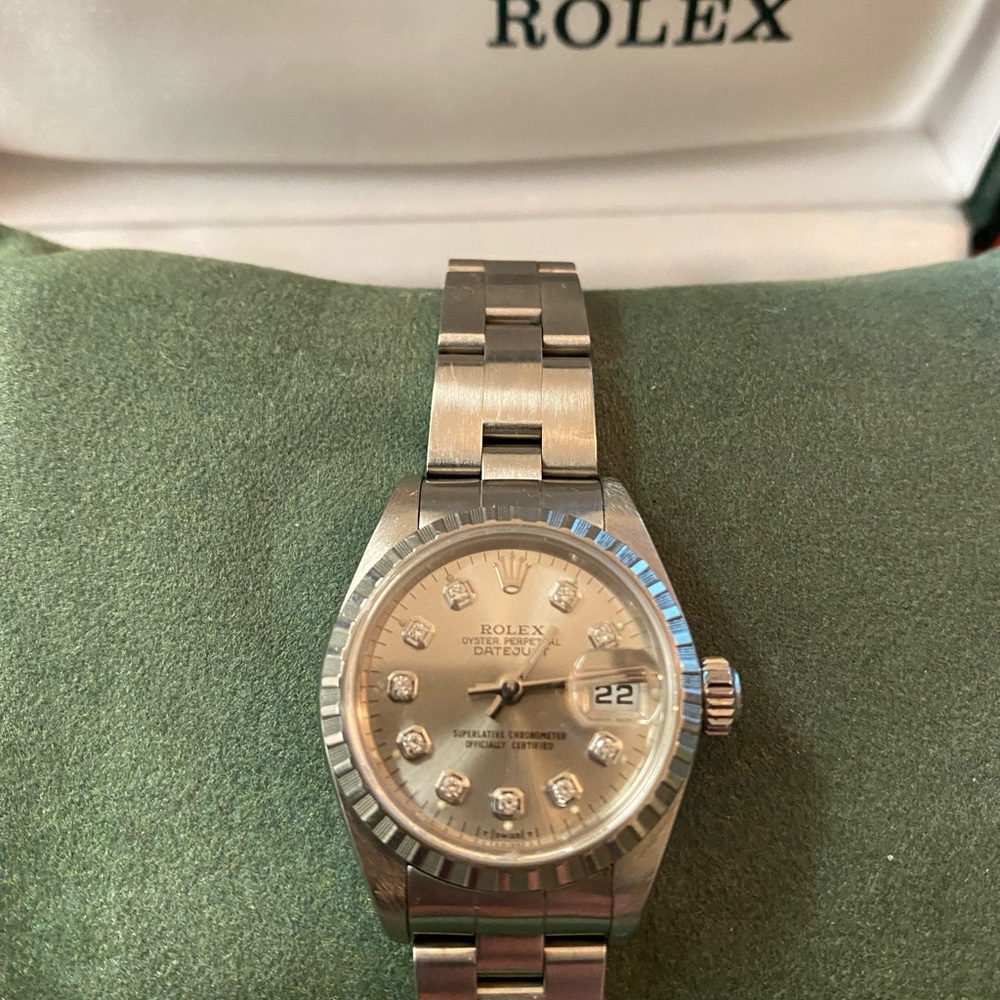 Rolex Oyster Perpetual Datejust 26mm w/Engine Turned Bezel w/10 Diamond Markers.
